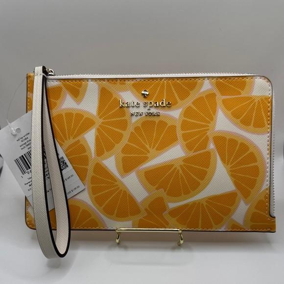 kate spade Handbags - Kate Spade Staci Medium L-zip Wristlet Orange Slice NWT
